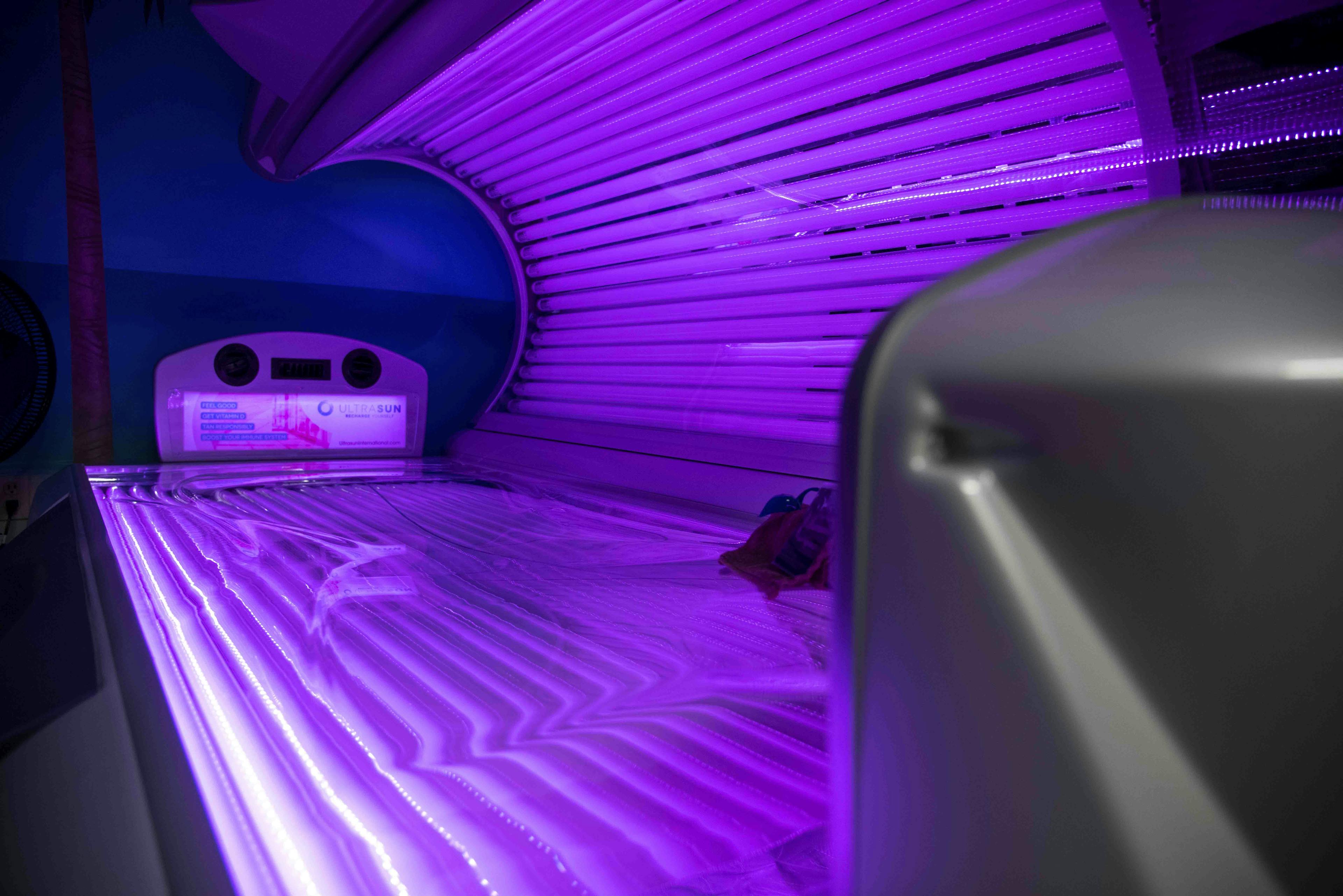 second red laydown tanning bed.